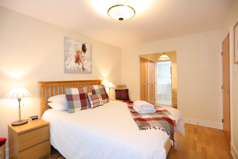 Master Bedroom with king size bed, en suite and dressing area