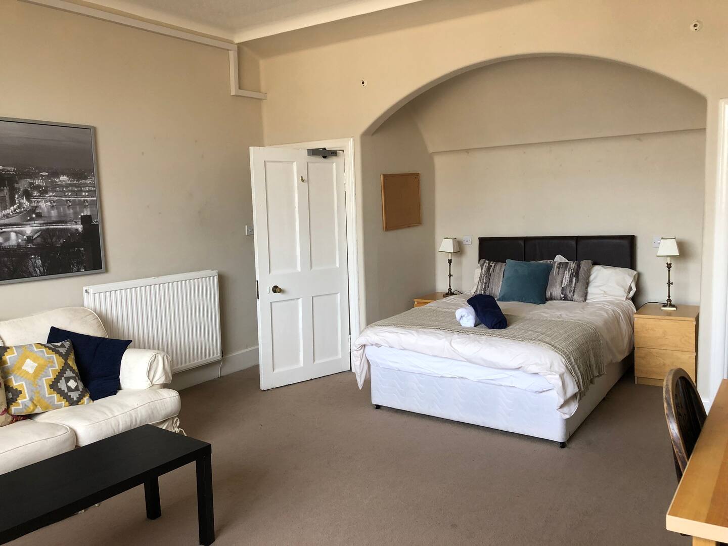 Top floor bedroom with bay window overlooking  Moray Place gardens