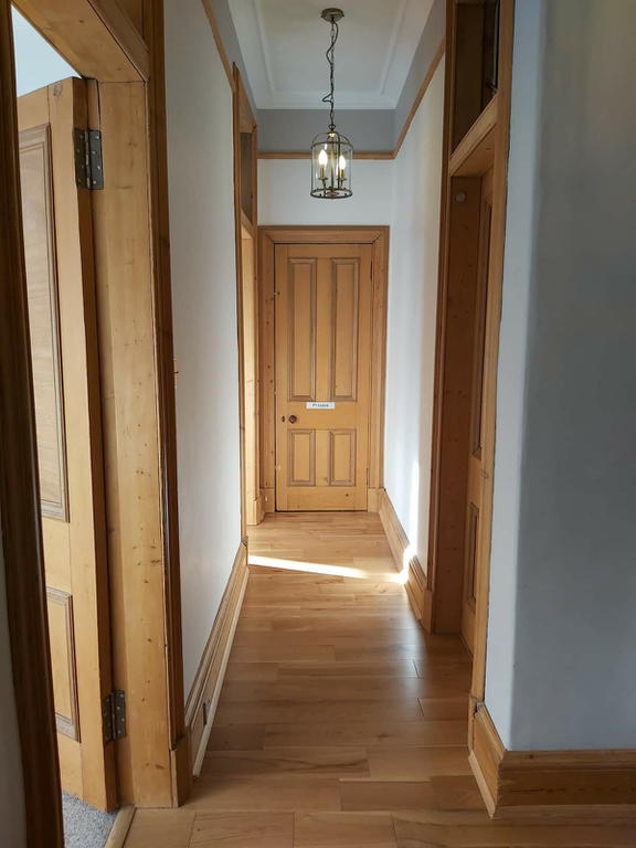 Corridor connecting bedrooms