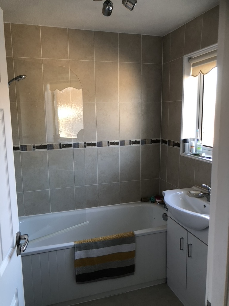 bathroom with instant shower