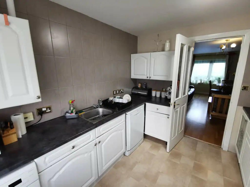 Kitchen with all the standard appliances. Large Fridge Freezer , Microwave, cooker with oven, washing machine and dishwasher