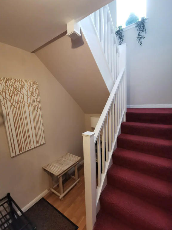 Entrance hall and stairs leading upstairs