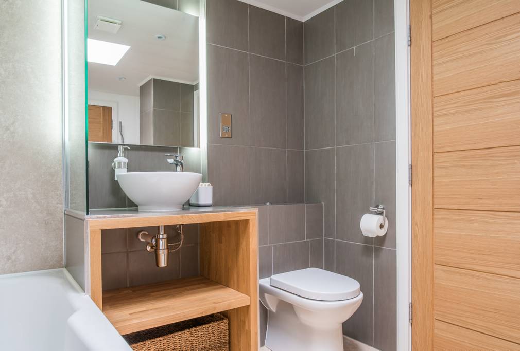 Bathroom with shower and bath on first floor