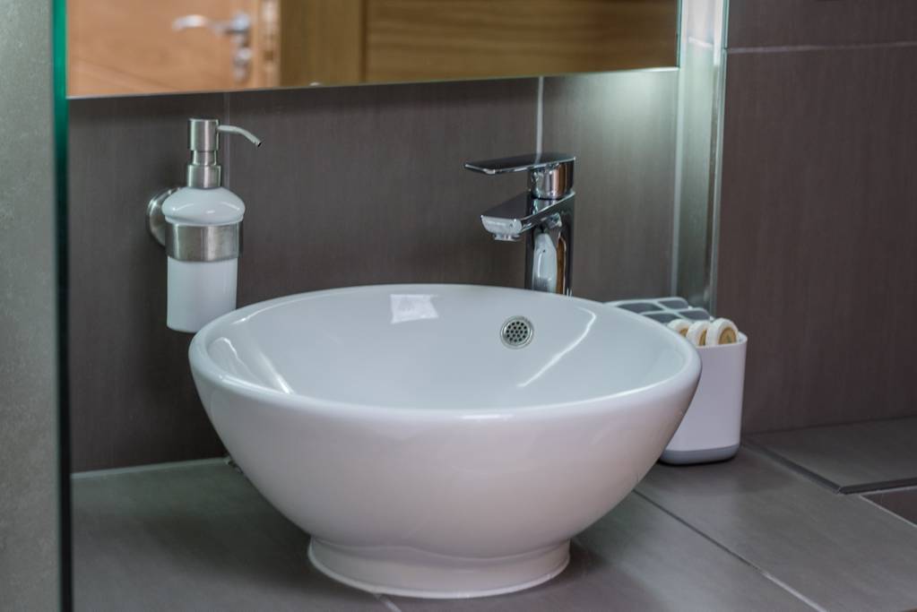 Bathroom with shower and bath on first floor