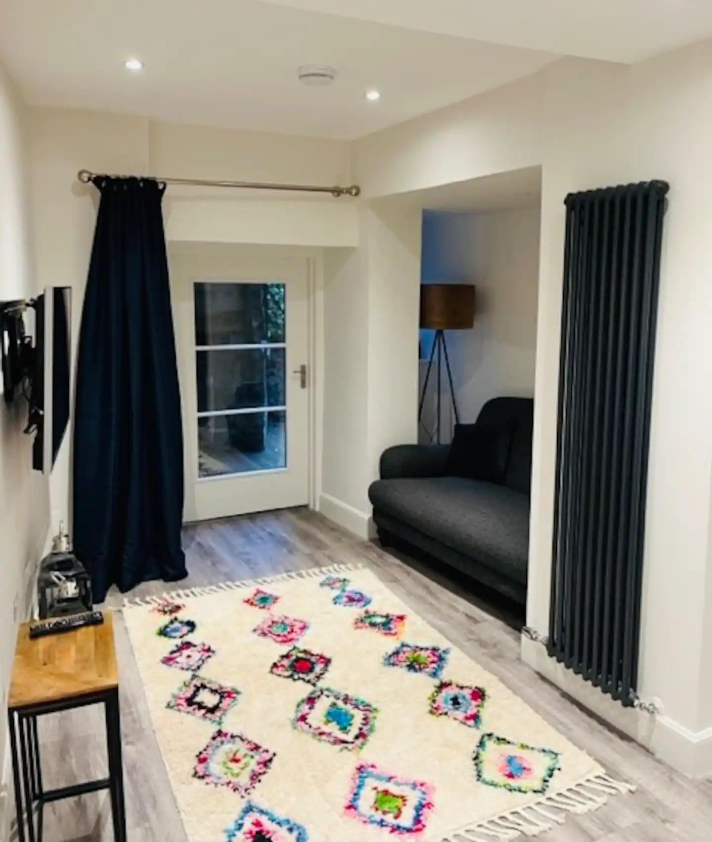 We have added a rug, curtain and tables since the professional photos were taken. The flat is now even more cosy and welcoming!