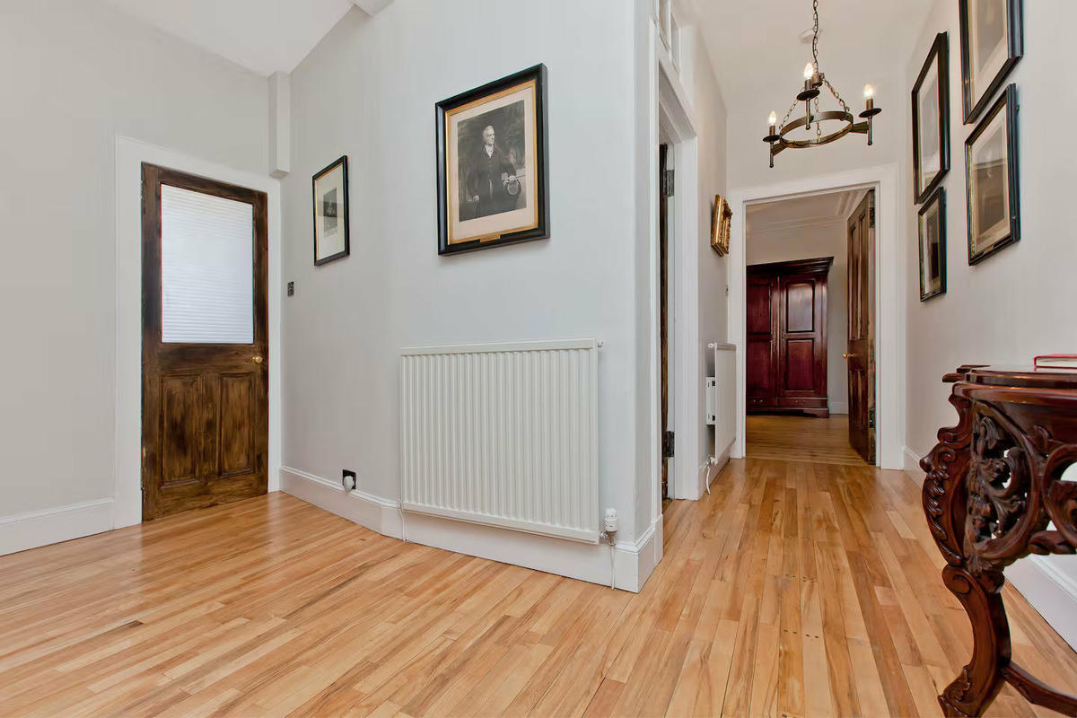 Warm and welcoming entrance hallway with Scottish charm.