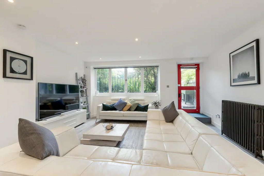 Living area with ample seating area and TV for all round viewing