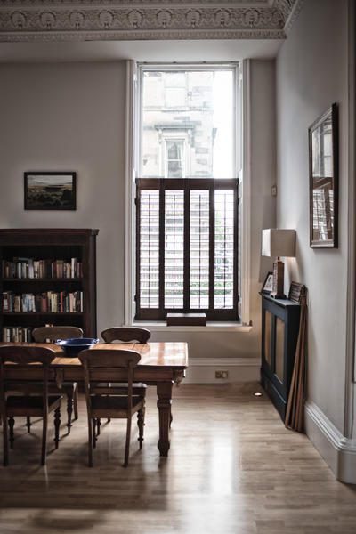 The dining table is in the living room